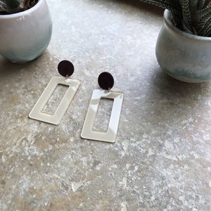 Cream and dark purple earrings H&M